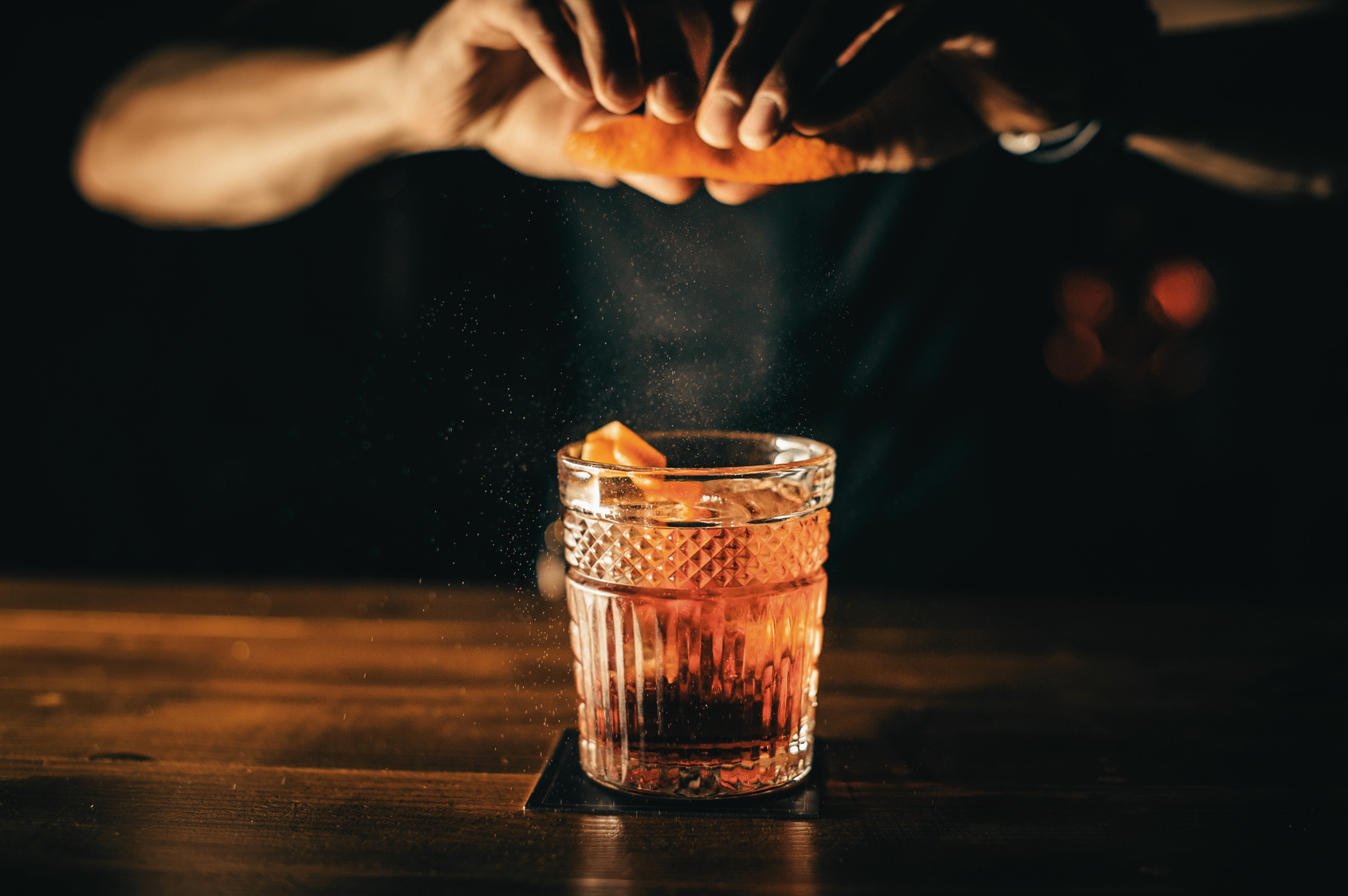 Amber rocks glass served by hand